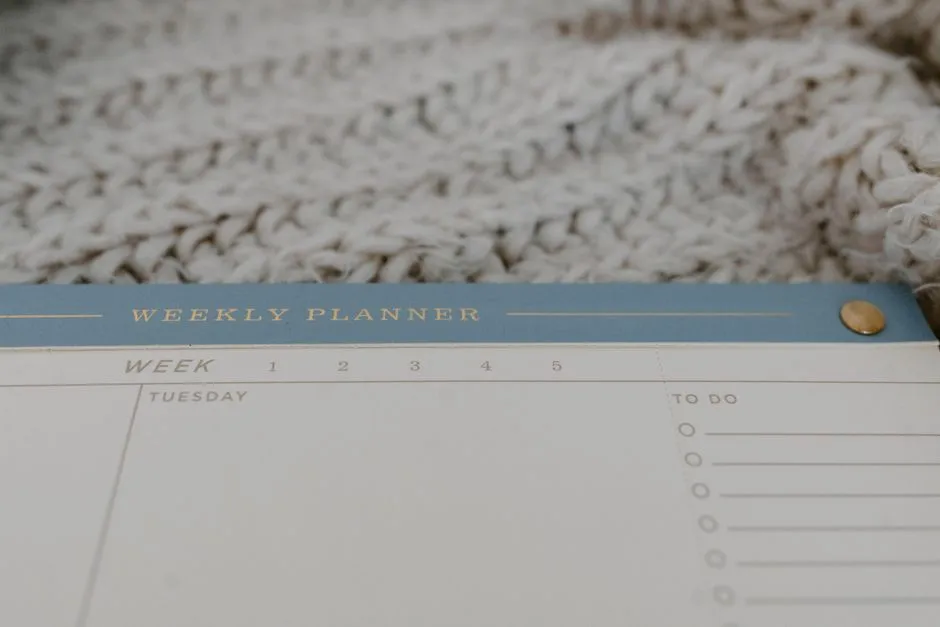 A weekly planner used to block out work hours around school pickup and dropoff